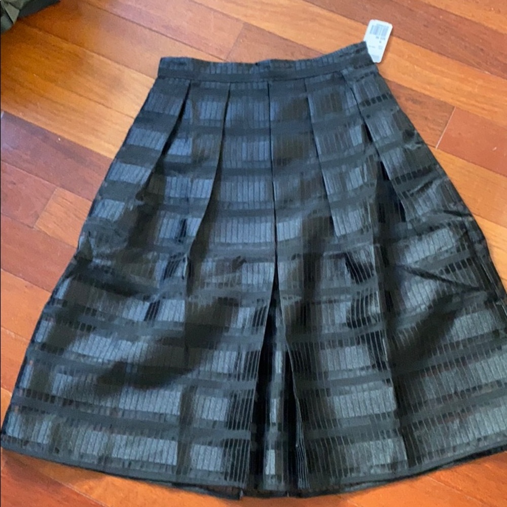 NWT: pleated black plaid skirt